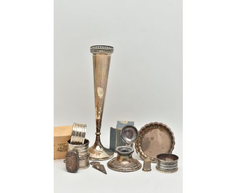 A PARCEL OF SILVER, comprising a harlequin set of three George V circular silver napkin rings, makers Henry Griffith &amp; So