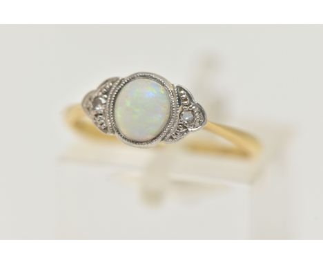 A YELLOW METAL OPAL AND DIAMOND RING, set with a central oval opal cabochon, flanked with single cut diamonds, in a white met
