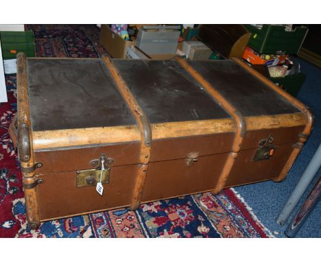 A LARGE VINTAGE STEAMER/TRAVEL TRUNK, early 20th century, wooden banded, green and white striped interior, contains a quantit