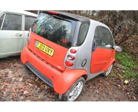 A 2003 SMART PASSION S-TOUCH 16A CAR, REGISTRATION NUMBER FJ03 UXY, in red, and silver trim, 698cc petrol engine, manual gear