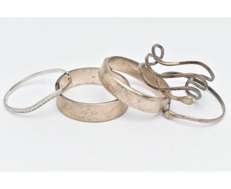 TWO SILVER BANGLES AND THREE WHITE METAL BANGLES, the first two hinged bangled with floral detail, both hallmarked Birmingham