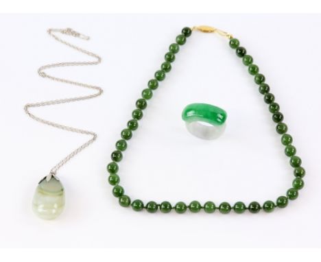 Jadeite jade carved ring, a nephrite jade necklace, and a banded agate pendantTo be sold in aid Oxfam .      CONDITIONNephrit