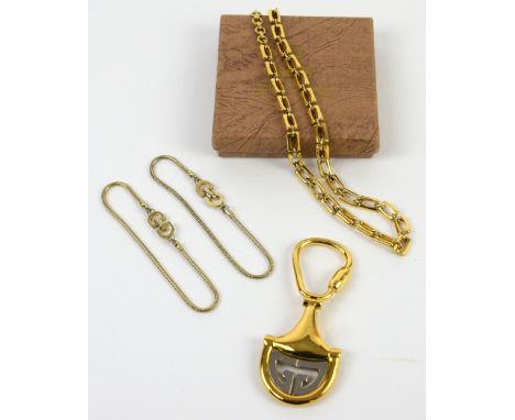Vintage Gucci key ring in original box, marked Gucci Italy, two matching Christian Dior bracelets, both clasps marked Chr. Di