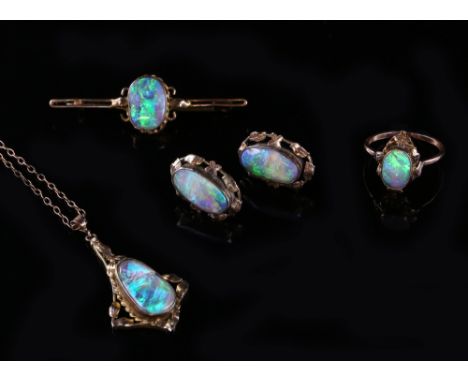 Early 20th C, Art Nouveau black opal jewellery set, oval cabochon cut opal ring, 10.5 x 6.7mm, ring size N, a pair of stud ea