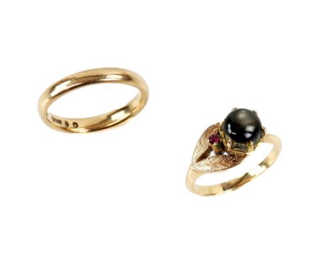 Vintage floral dress ring, set with round cabochon cut star sapphire, and round cut ruby, mount stamped 18 ct, ring size M ha