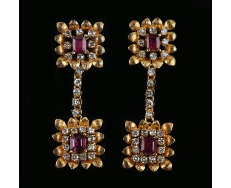 A pair of vintage ruby and diamond drop  earrings, with step cut rubies within a diamond border petal edged setting, 10 ct go