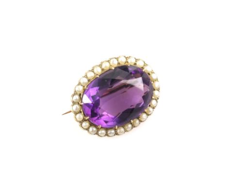 Amethyst and pearl set brooch, the oval cut amethyst of around 25.00 carats, within a border of pearls, in gold mount with in