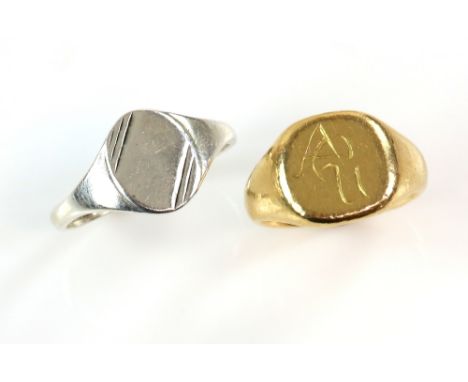 Two signet rings, one vintage with engrave monogram, in 18 ct yellow gold, ring size J and a oval silver signet, size S.     