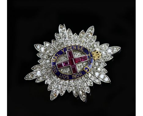 Order of The Garter Star brooch set with diamonds and ruby with enamel band and the motto Honi Soit Qui Mal Y Pense, in unmar