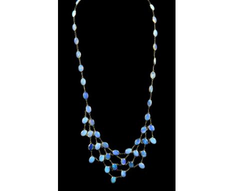 An opal set fringe necklace, cabochon cut opals spectacle set, in 14 ct yellow gold, length 22cm.      CONDITIONGross weight 