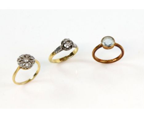 Three rings, one single stone diamond, size L, Edwardian cluster, Size M and aquamarine dress ring, size L, all mounted  in 1