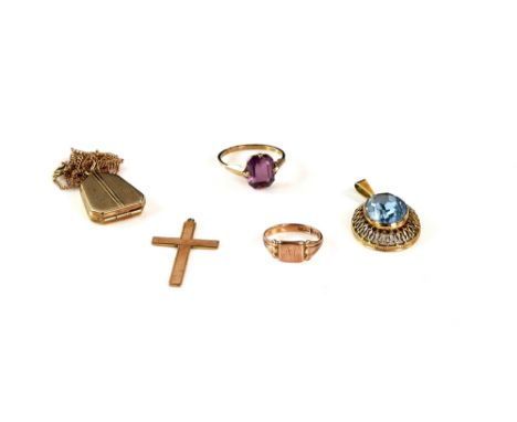 Group of gold jewellery, locket  with engine turned decoration, a pendant set with blue paste, chain, two rings and a cross p