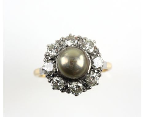 Grey pearl cluster ring, surrounded by eight round brilliant cut diamonds, estimated total diamond weight 1.20 carats, mounte