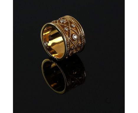 Gold Etruscan style ring set with diamonds and beaded decoration within a rope twist border, signed by Yanes Madrid, marks fo