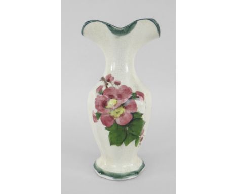 A SMALL LLANELLY POTTERY SPILL VASE with faceted body and shaped neck, painted with briar-roses, stencilled Llanelly to base,