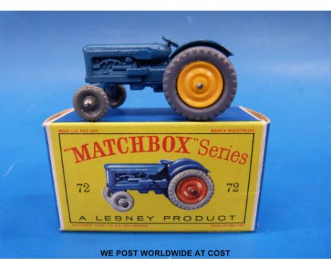 Matchbox Lesney type D diecast model Fordson tractor with blue body, orange front and yellow rear hubs, grey plastic tyres an