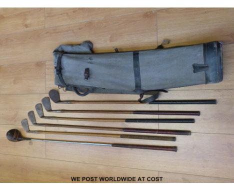 Five hickory shafted golf clubs together with a Red Triangle Recorder wood, all Scottish made and in period bag