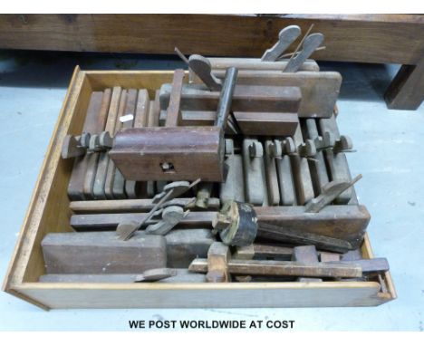 A collection of vintage woodworking planes and scribes including named brass and rosewood example by Howard