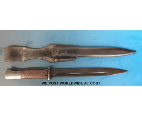 A German Mundlors bayonet marked 38 to back of blade and S165 to one side, scabbard marked 43 asw and 1031XX