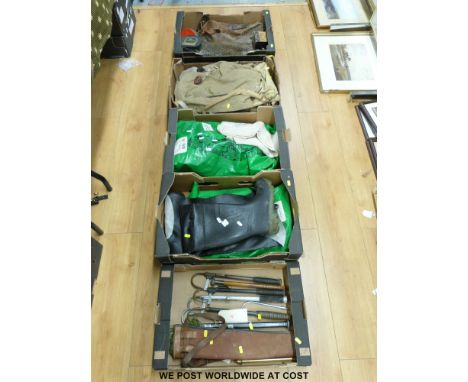 A collection of vintage fishing gaffs including a Hardy example, scales, waders, fishing bags and accessories