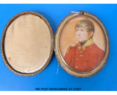 An oval portrait miniature of a gentleman in uniform, with silver gilt mount marked B'ham 1926 -27 maker EML for E Mander Ltd