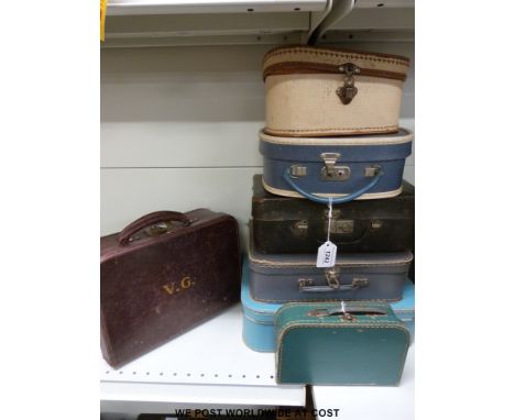 Seven vintage childs suitcases, one with gilt lettering and fitted interior 