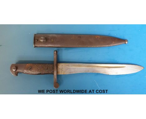 A Spanish model 1941 Bolo bayonet in scabbard, 25cm blade