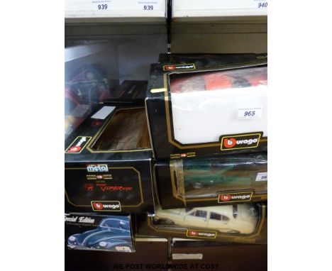 Thirteen Burago and Maisto 1:18 scale diecast model vehicles all in original boxes 