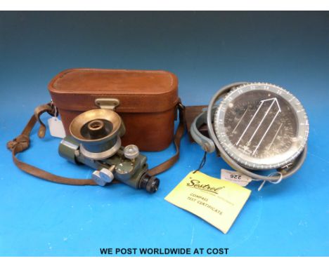 A 'Sestrel' ship's compass, Hilger Watts surveyor's level and a set of travelling scales 
