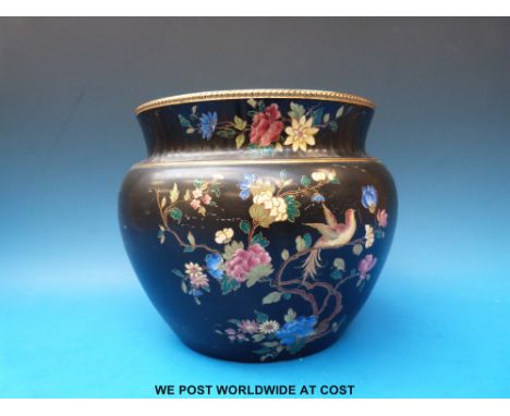 A Carltonware jardiniere with enamel decoration of birds and flowers.  