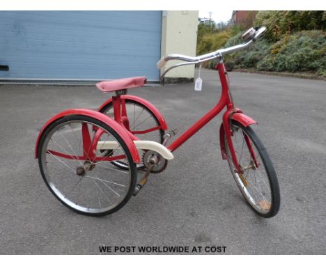 A vintage red 'Continental' child's bicycle (height of seat at lowest setting 54cm)