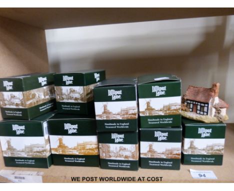 Nine Lilliput Lane cottages in dark green era boxes: Little Beehives, Little Tea Caddy etc boxed with certificates together w