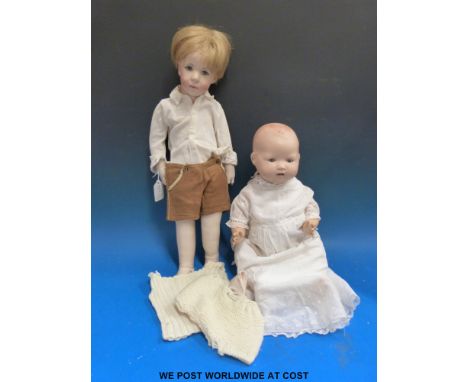 Two vintage dolls, one marked BND London