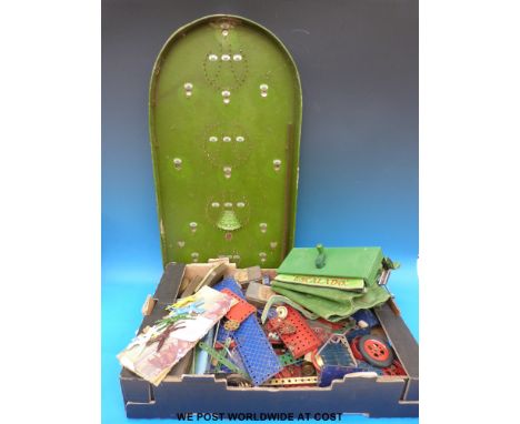A corinthian bagatelle board, Meccano pieces and a Chad Valley Escalado game