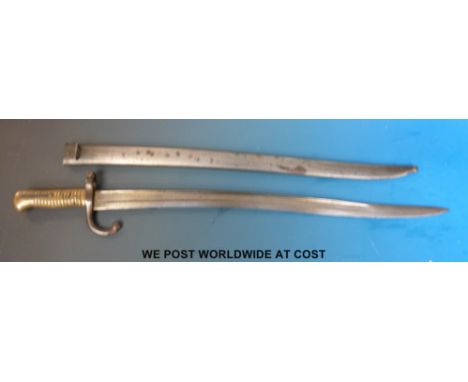 A French model 1866 Chassepot sabre bayonet in scabbard, 58cm blade