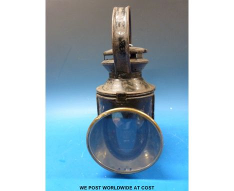 An LMS tri colour railway hand lamp with LMS stamped to the side and brass plaque numbered 43436