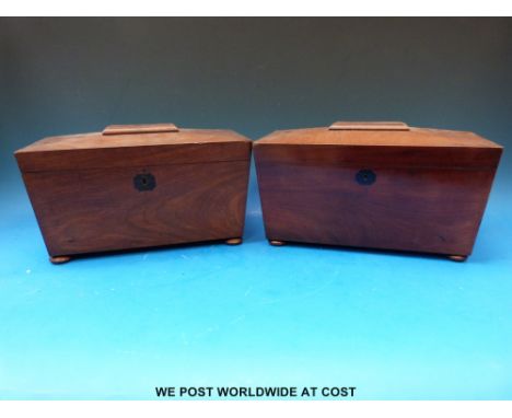A tea caddy raised on bun feet with fitted interior together with another example