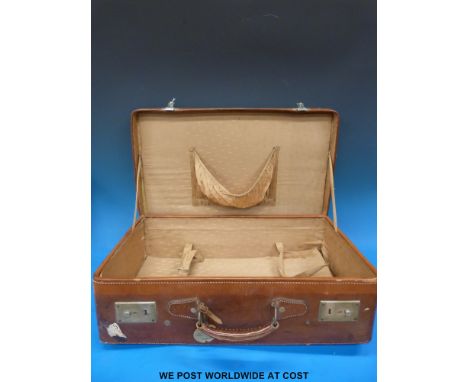 A vintage suitcase with lined interior and Cunard label, W.H.H Kimberley to top