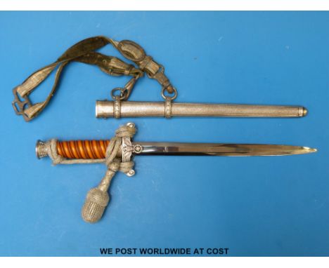 A WW2 Nazi German Army officer's dress dagger with 25.5cm blade, original hangers and portepee knot (overall length 40cm)