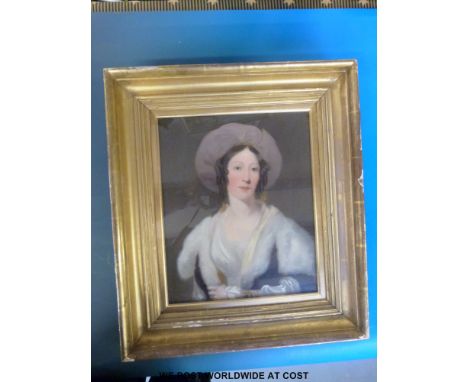 An early 19thC oil on canvas, half bust portrait of a lady with label to verso "Ann Fraser nee Cumming, wife of James Fraser"