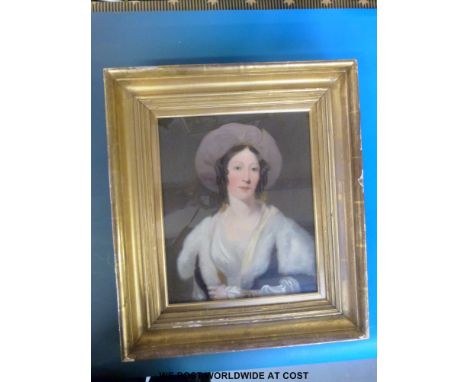 An early 19thC oil on canvas, half bust portrait of a lady with label to verso "Ann Fraser nee Cumming, wife of James Fraser"