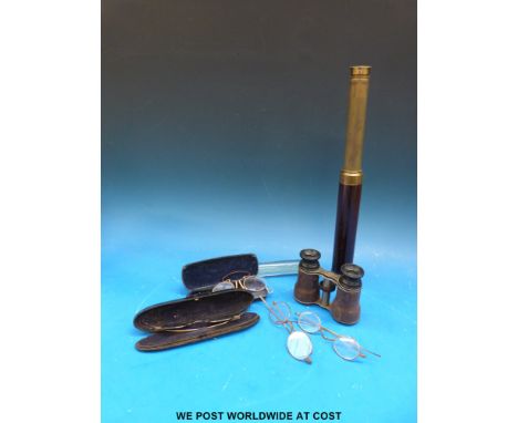 A collection of items including a Georgian inlaid spectacle case, vintage spectacles, opera glasses, brass telescope, glass t