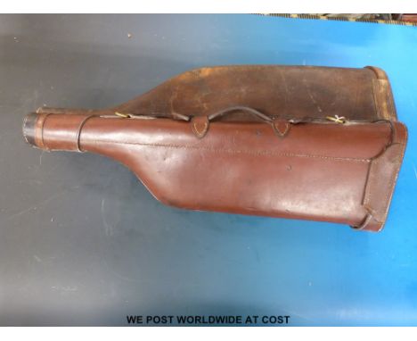 Two vintage leather leg of mutton gun cases