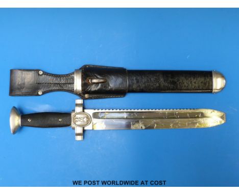 A German Nazi Third Reich Red Cross enlisted Hewer dagger with black plastic grips, and 26.7cm serrated, square tipped blade 