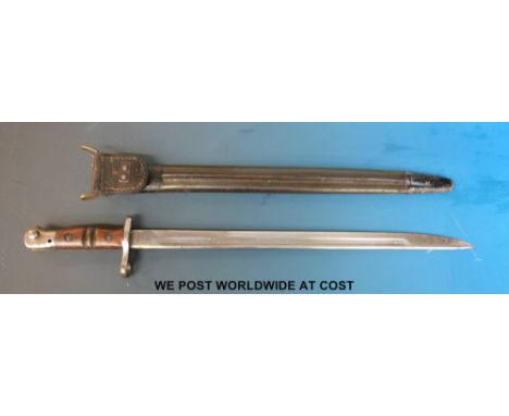 A USA model 1917 Enfield bayonet in scabbard, 43cm blade, with belt frog clip