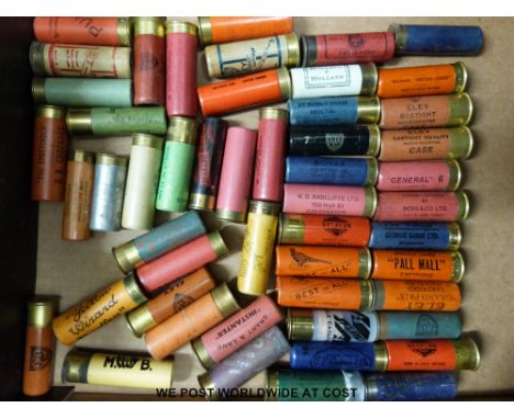 Fifty mainly 12 bore shotgun cartridges by William Evans, George Gibbs, Boss & Co, Powell & Son, Hellis, Holland & Holland, K