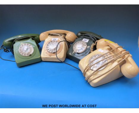 Four vintage telephones, two in ivory and green, GPO FWR /80 etc