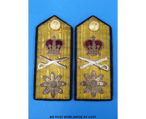 A pair of Victorian Royal Naval high ranking officer's epaulettes decorated with gold thread and silver stars/ sword and scab