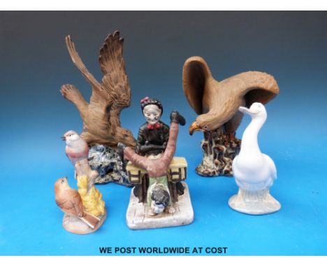 A pair of stoneware figures of eagles on a glazed rock bases, impressed 116, a Lladro Nao goose and two others