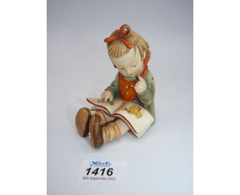 A circa 1935 Hummel Goebel figure 'The Bookworm'.